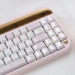 Whimsical My Melody ceramic keycaps, exquisite craftsmanship. The adorable design with glossy pastel finish is shown from a detailed angle.