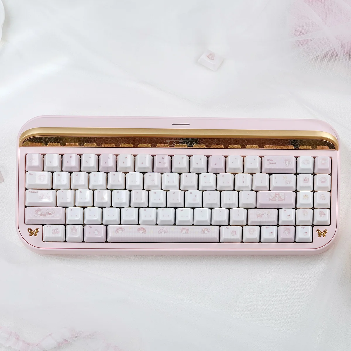 Whimsical My Melody Ceramic Keycaps set, highlighting exquisite craftsmanship and adorable pastel designs with a luxurious glossy finish.