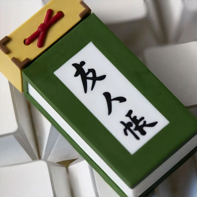 Detailed view of the Natsume's Book of Friends 2U keycap, showcasing its serene Japanese folklore art and the iconic Book of Friends.