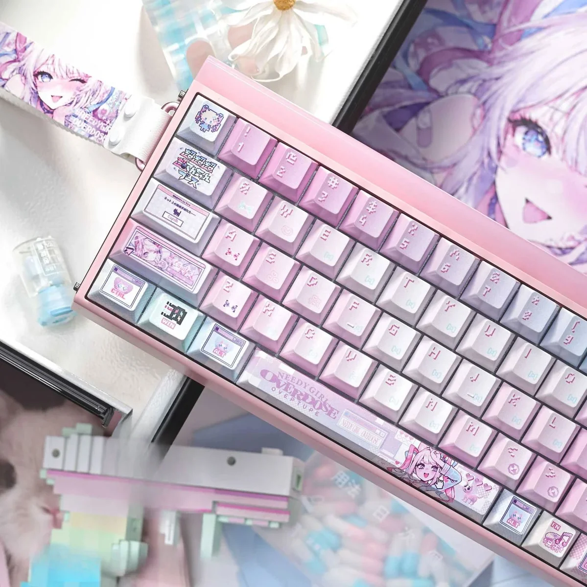 Vibrant KAngel anime art adorns these exclusive Needy Streamer Overload 3.0 PBT keycaps, captured from various angles to showcase their pearlescent finish.