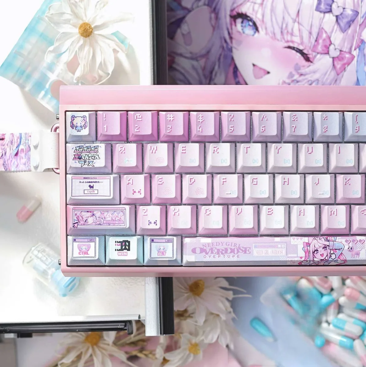 Close-up of the exclusive Needy Streamer Overload 3.0 PBT keycap set, showcasing vibrant KAngel anime art and a pearlescent finish from multiple angles.