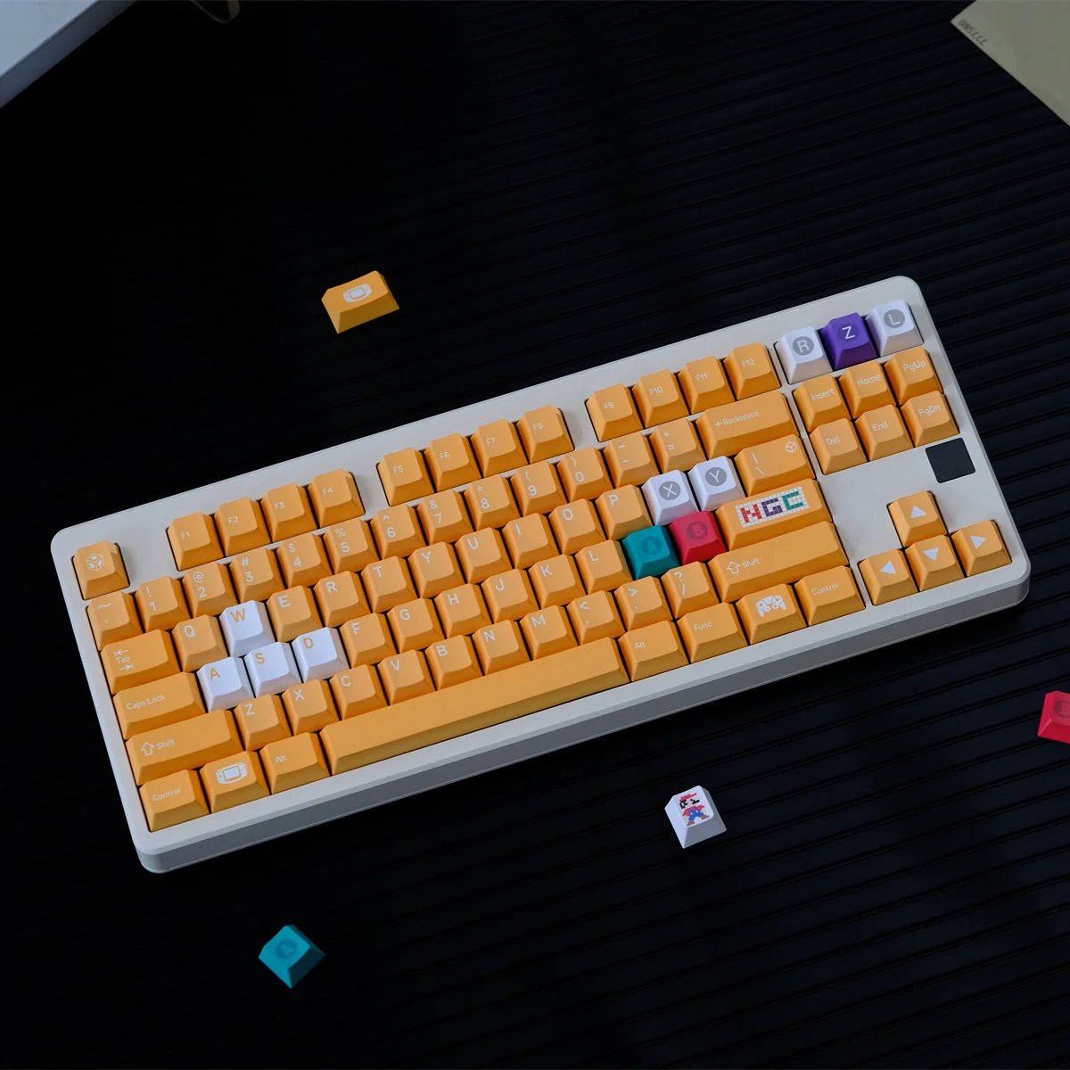 Premium Nintendo GameCube keycap set displayed from various angles, highlighting its nostalgic retro gaming design, vibrant yellow accents, and superior Cherry profile.