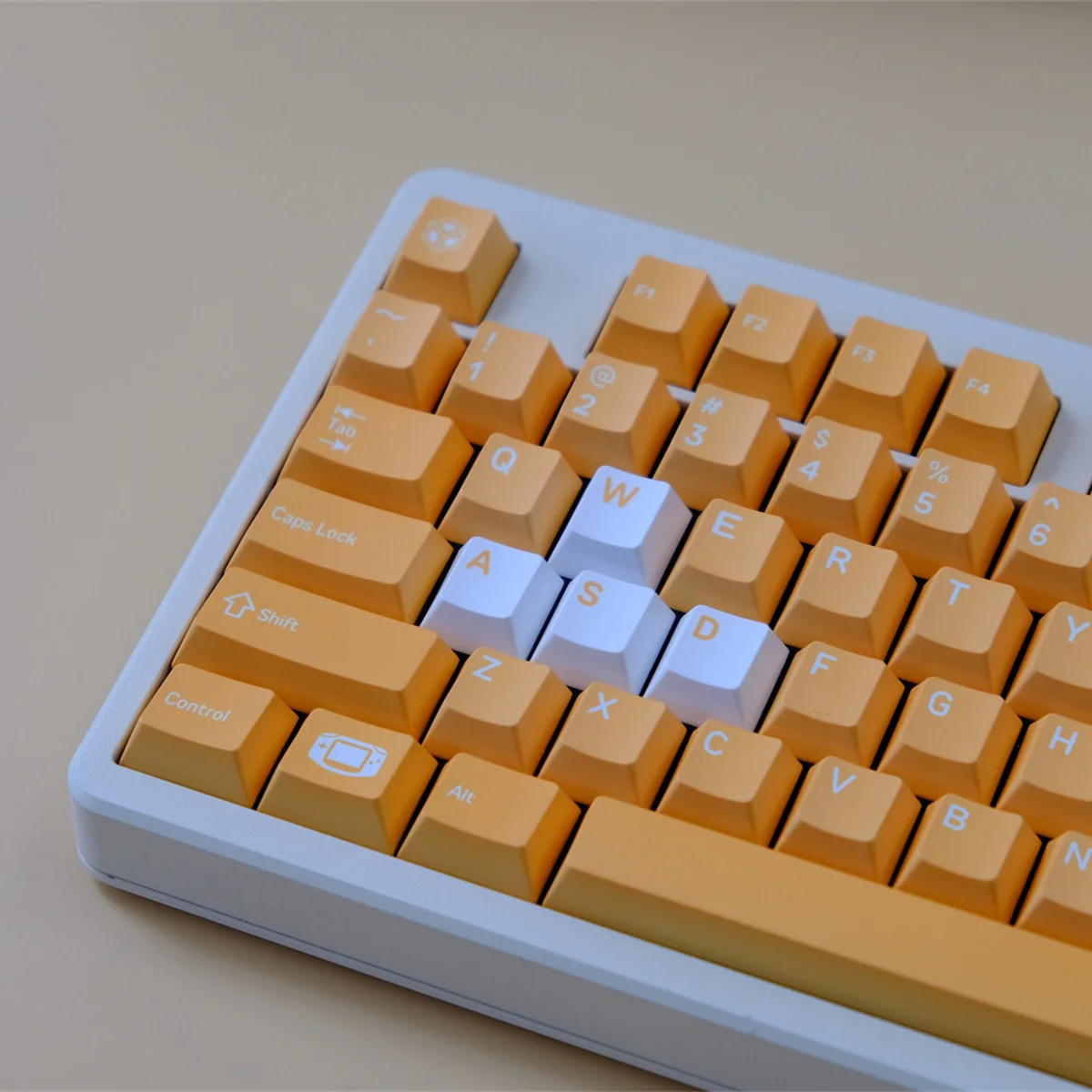 Premium Nintendo GameCube Keycap Set showcasing its retro gaming Cherry profile from multiple angles, highlighting vibrant yellow accents and nostalgic console design.
