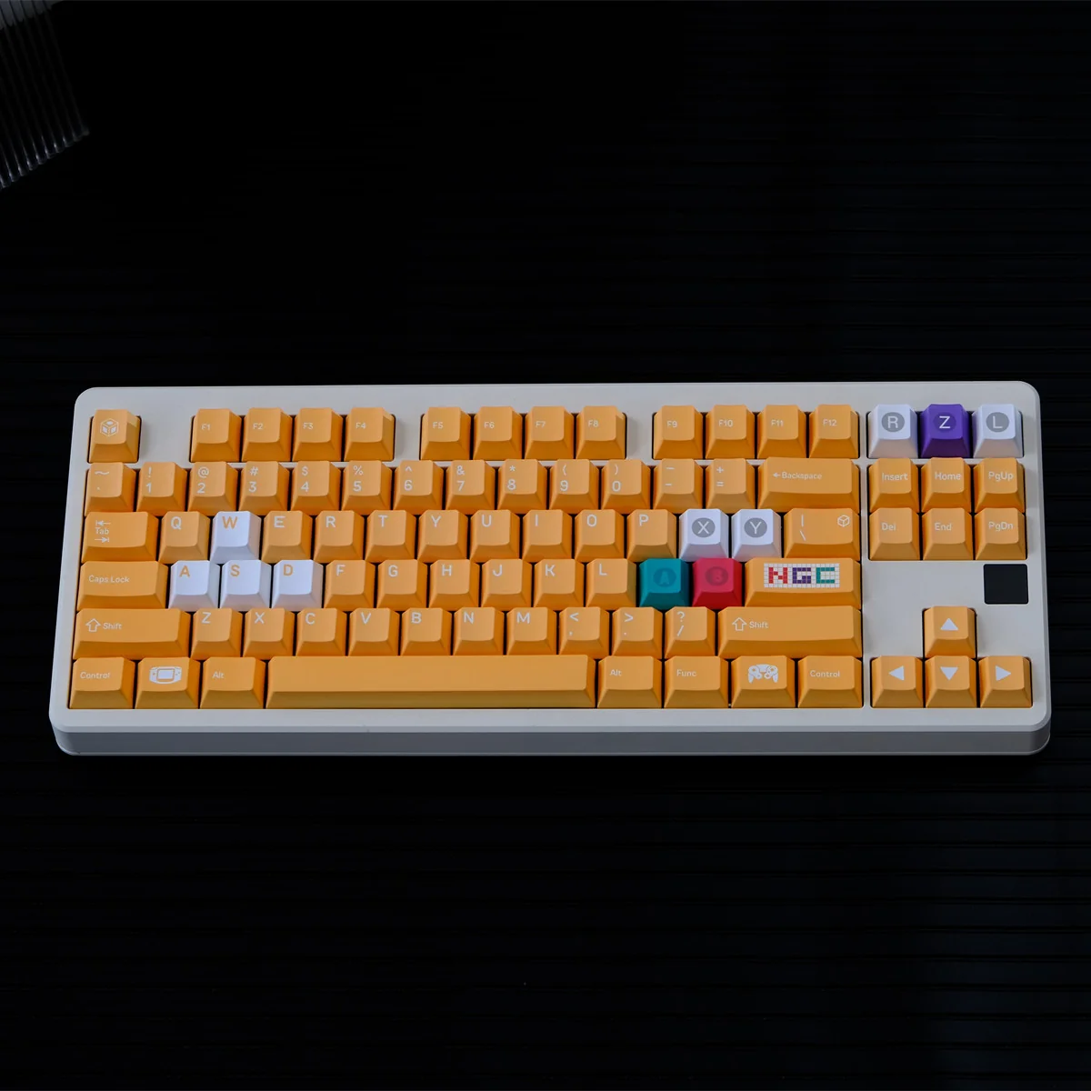 remium Nintendo GameCube keycap set featuring a nostalgic retro gaming design with vibrant yellow accents, crafted for an ergonomic Cherry profile.