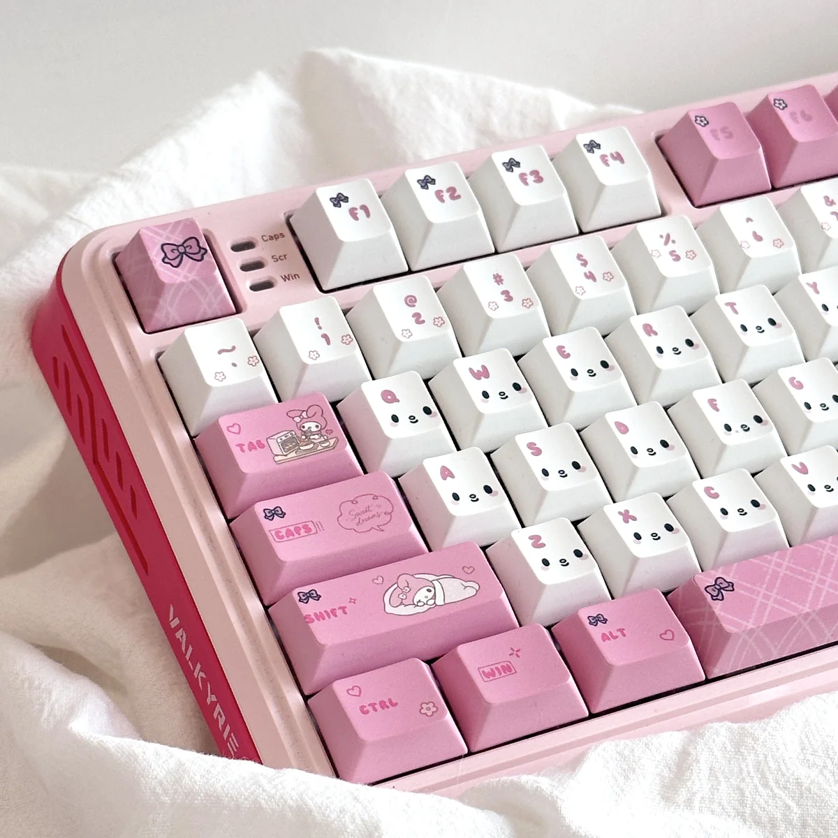 Gallery of the adorable My Melody PBT dye-sub keycap set. See charming pastel pinks and iconic character art from various playful angles.