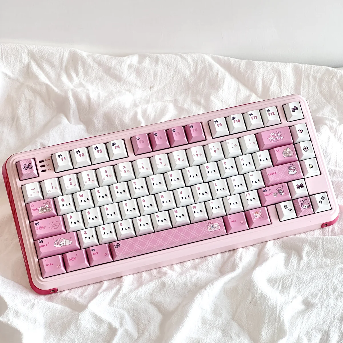 Adorable My Melody PBT Dye-Sub keycaps set, beautifully showcasing iconic character art in soft pastel pinks for a charming, playful keyboard.
