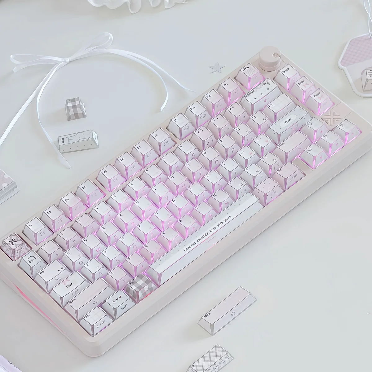 Pastel pink Love Mailbox keycaps with gingham, bows, hearts and side-lit PBT legends, shown as a 145-key boxed set.