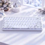 Polar Bear keycaps on a white 139-key PC MOA keyboard with playful bear novelties, displayed in a cozy snow globe winter scene.