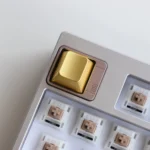 Premium zinc alloy metal keycap showcased from multiple angles, highlighting its sleek metallic finish and minimalist design for an industrial elegance.