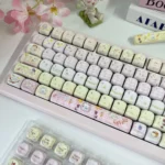 Adorable Puppy Wish Day Keycaps: dye-sub PBT MOA keycaps close-up. Whimsical puppies dream under starlit pastel skies, a charming, playful aesthetic.