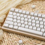 Elegant Rose Sonata MOA PBT keycaps with a romantic rose garden motif, featuring crisp black legends on creamy PBT, perfect for artistic typing.