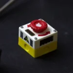 Rotatable emergency keycap from various angles, showcasing its interactive, vibrant industrial design and premium details for keyboards.