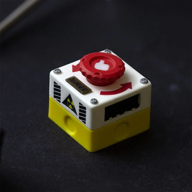 Rotatable emergency keycap from various angles, showcasing its interactive, vibrant industrial design and premium details for keyboards.