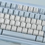 Multiple angles of the whimsical Cinnamoroll ceramic MX keycaps set, revealing the dreamy pastel hues and smooth, premium tactile ceramic finish.