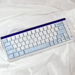 Dreamy Cinnamoroll PBT Keycaps showcase adorable character art and soft pastel hues. Durable PBT provides joyful personalization, viewed from all angles.