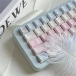 Sky of Love Cherry Keycap Set, from an artistic angle, reveals serene pastel legends. This full keycap set embodies a dreamy design.