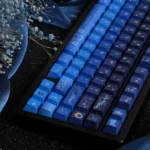 Starry Night Corridor Keycap Set from multiple artistic angles, showcasing immersive deep blue and purple cosmic landscapes and ethereal stardust.