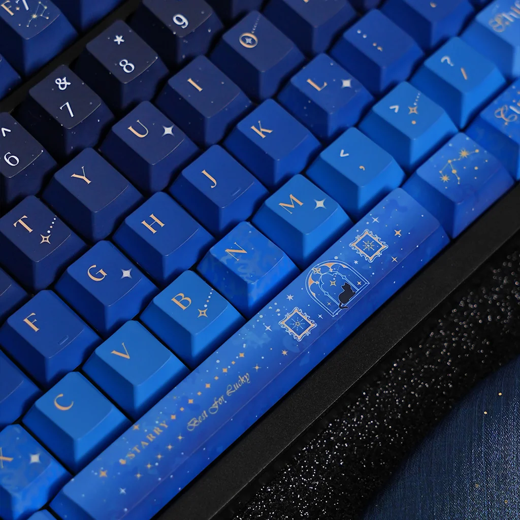 Starry Night Corridor Keycap Set reveals its immersive deep blue/purple cosmic scenes, stardust & pathways from artistic angles.