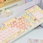 Adorable Sumikko Gurashi translucent MOA keycaps set, featuring whimsical characters with milky finishes, viewed from various playful perspectives.