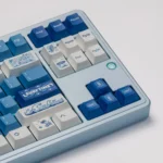 Artistic Surfing Keycap Set product gallery, showcasing the vibrant blue and white ocean wave aesthetic from multiple angles.