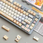 Artistic PBT Sushi Keycap Set, showing unique Japanese Sushi House motifs and geometric folded shadow designs from different angles.