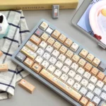 Sushi Keycap Set: Artistic PBT keycaps with unique Japanese Sushi House motifs and elegant geometric folded shadow designs.