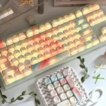 Translucent MOA keycaps 134-key Jade Dream set shine with pastel marble swirls, jade glow, and soft backlit gradients.