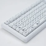 UR98 white tri-mode silent mechanical keyboard, showcasing its minimalist design and whisper-quiet coconut milk switches for effortless typing.