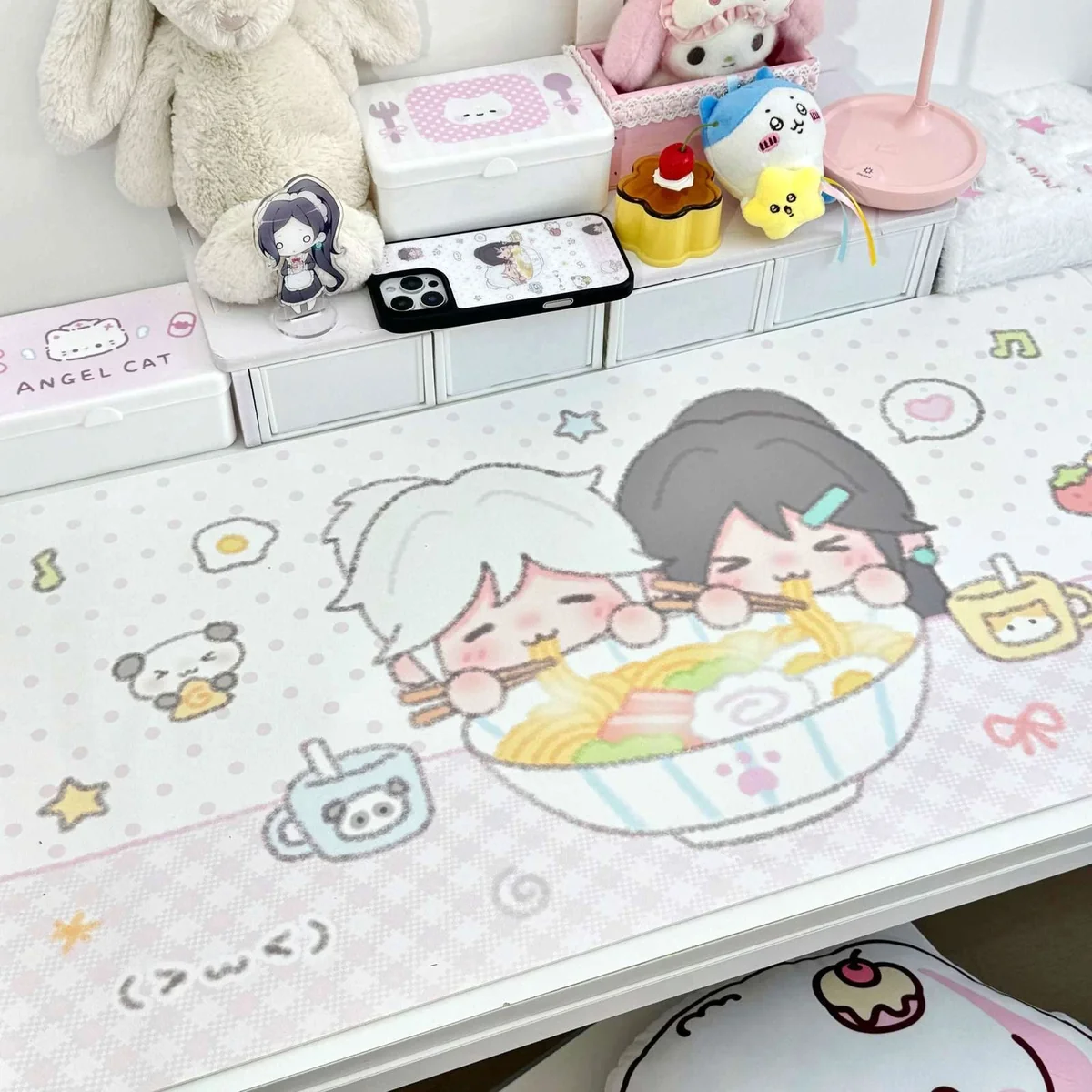 Valorant desk mat showcasing vibrant anime art of characters with playful ramen motifs, highlighting its waterproof, non-slip surface ready for epic gaming.