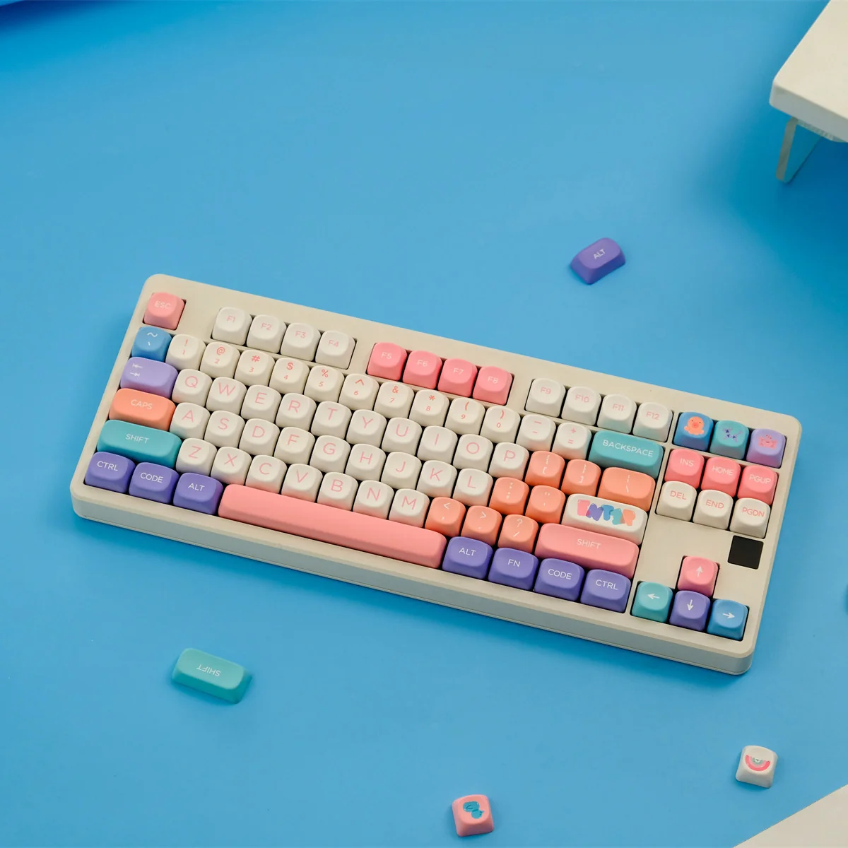 A playful, vibrant Whimsical Balloon Party MOA Keycaps Set shown from a dynamic angle, highlighting its unique balloon designs and MOA profile.