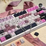 Close-up view of a whimsical dollhouse keycap, showcasing its exquisite handcrafted miniature art with intricate details for your keyboard.