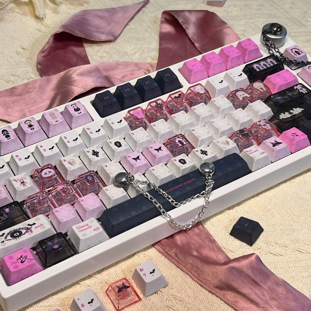 Close-up view of a whimsical dollhouse keycap, showcasing its exquisite handcrafted miniature art with intricate details for your keyboard.