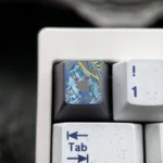 Main image of an exquisite hand-carved Wuthering Waves The Shorekeeper titanium ESC keycap, highlighting its intricate details and premium metallic.